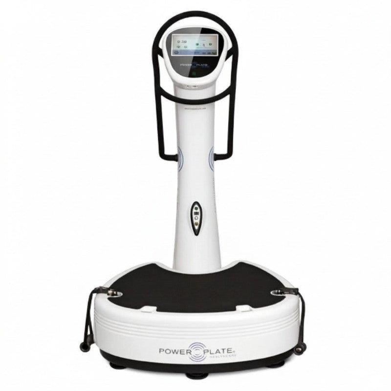White vibration plate with digital display on a white background