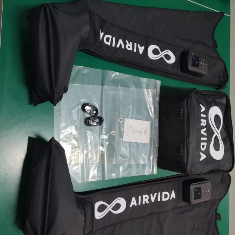 Airvida air purifier parts on a green surface