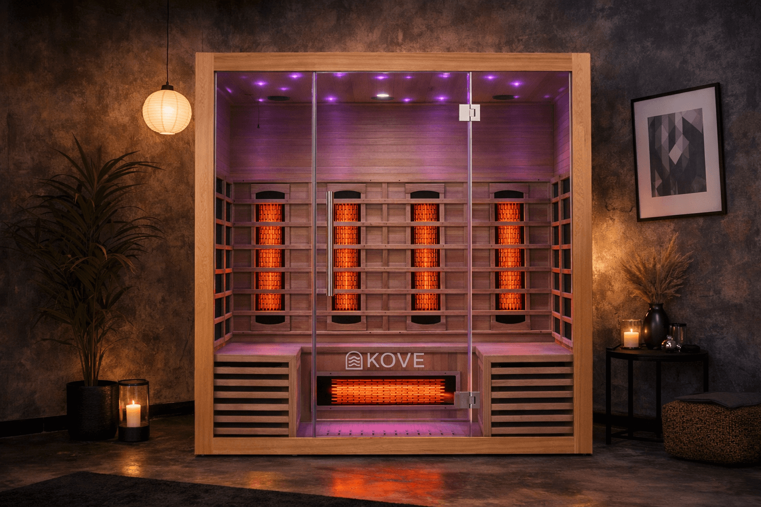 Infrared sauna with 'Kove' branding in a dimly lit room.
