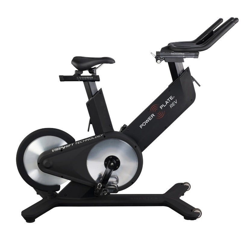 Black exercise bike with 'Power Plate' branding on a white background