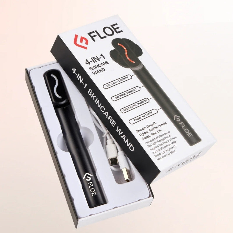 Floe 4-in-1 skincare wand with packaging on a beige background